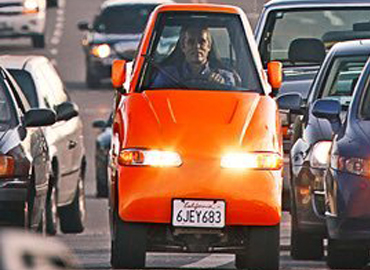 A Narrow Car Driving on the Highway